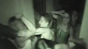 Girls brawling in the dark.