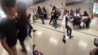 Two girls jump a student in school for no reason