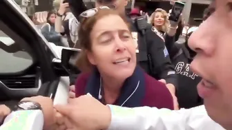 Average Zionist Woman Tries to Steal Keffiyeh From Pro-Palestinian Jews