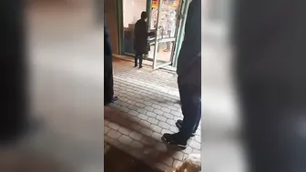 Drunk guy gets laid out in a karate chop fight.