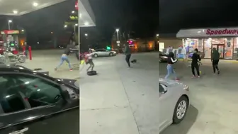 Chick jumps Guy With Gas Pump