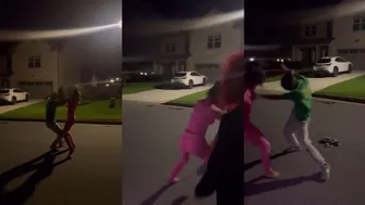 Two Girls Engage In A Silent Street Clash