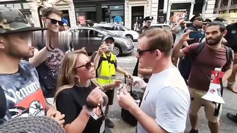 Man eats kebab in front of animal activists.