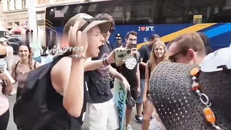 Man eats kebab in front of animal activists.