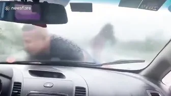 A Man Clung To His Exs Male Friends Car For 13 Miles