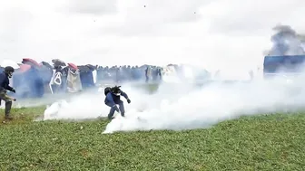Police And Protesters Clash In Sainte-Soline, France. Police Vehicles Set On Fir