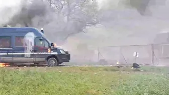 Police And Protesters Clash In Sainte-Soline, France. Police Vehicles Set On Fir