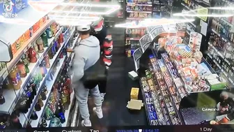 Man tries to rob a guy in a supermarket but it doesnt go his way.