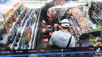 Man tries to rob a guy in a supermarket but it doesnt go his way.