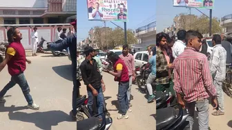 Indian guys battling over pan masala.